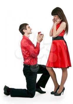 Royalty Free Photo of a Man Proposing to a Woman
