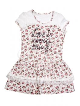Womens summer dress with floral pattern and the words Love is every thing. Isolate on white