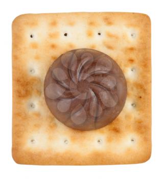 Round chocolate candy with crackers on a white background
