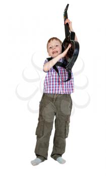 The boy with the electronic guitar isolated on white background