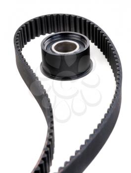 Roller and timing belt isolated on white