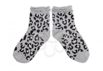 Pair of gray socks with black pattern. Isolate on white.