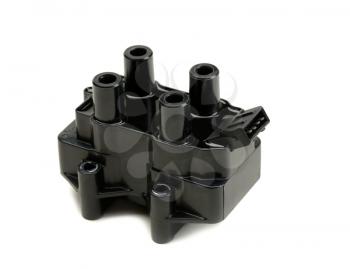 Ignition coil for gasoline four-cylinder internal combustion engine. Isolate on white.