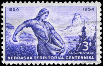 Royalty Free Photo of 1954 US Stamp Shows Mitchell Pass, Scotts Bluff and The Sower, by Lee Lawrie, Nebraska Territory Issue