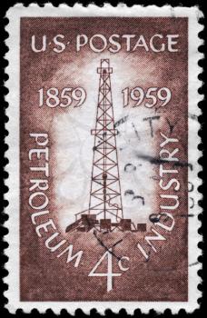 Royalty Free Photo of 1959 US Stamp Shows the Oil Derrick, Petroleum Industry Issue