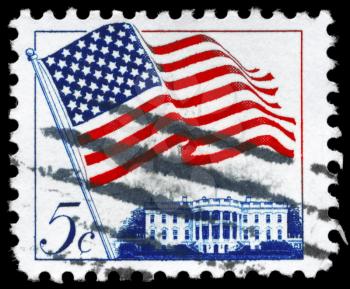 Royalty Free Photo of 1963 US Stamp Shows the Flag US Over White House