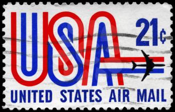 Royalty Free Photo of 1968 US Stamp Shows the USA inscription and Jet
