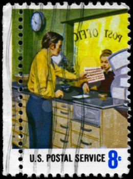 Royalty Free Photo of 1973 US Stamp Shows the Stamp Counter, Postal Service Employees
