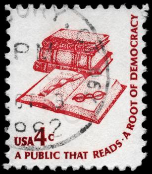 Royalty Free Photo of 1975 US Stamp Shows Books, Bookmark and Eyeglasses