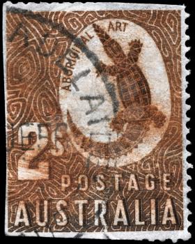 AUSTRALIA - CIRCA 1948: A Stamp printed in AUSTRALIA shows the image of a Crocodile with the description Aboriginal Art, circa 1948