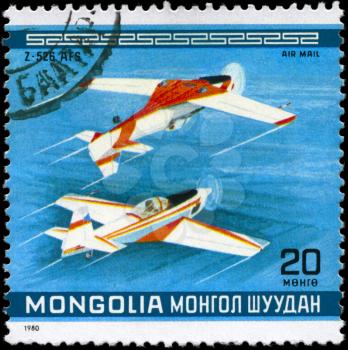 MONGOLIA - CIRCA 1980: A Stamp printed in MONGOLIA shows the Z-526 AFS Stunt Planes, Czechoslovakia, from the series 10th World Aerobatic Championship, circa 1980
