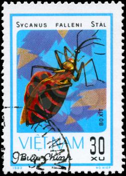 VIETNAM - CIRCA 1982: A Stamp printed in VIETNAM shows the image of a Assassin Bug with the description Sycanus falleni Stal from the series Chinch Bugs, circa 1982