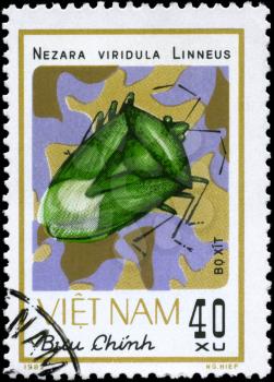 VIETNAM - CIRCA 1982: A Stamp printed in VIETNAM shows the image of a Green Stink Bug with the description Nezara viridula Linneus from the series Chinch Bugs, circa 1982