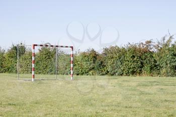Royalty Free Photo of a Soccer Net in a Field
