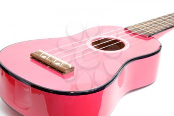 Royalty Free Photo of a Small Pink Guitar