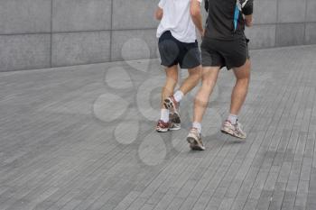Royalty Free Photo of Two People Running