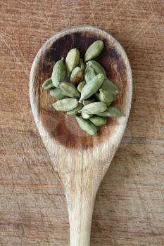 Royalty Free Photo of a Spoonful of Cardamom Seeds
