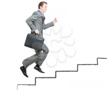 Royalty Free Photo of a Businessman Going Upstairs