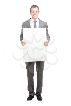 Royalty Free Photo of a Businessman Holding a Sign