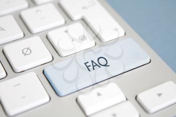 Royalty Free Photo of an FAQ Button on a Keyboard