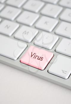Royalty Free Photo of a Virus Button on a Keyboard