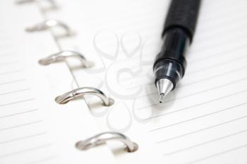 Royalty Free Photo of a Pen on an Agenda