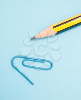Royalty Free Photo of a Pencil and Paperclip