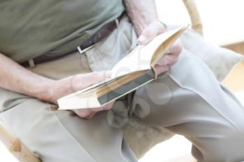 Royalty Free Photo of an Old Man Reading