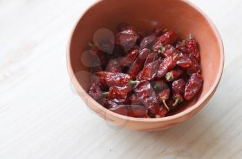 Royalty Free Photo of a Bowl of Dried Chilis