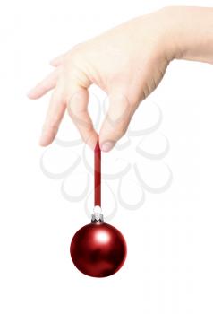 Royalty Free Photo of a Person Holding a Christmas Ornament