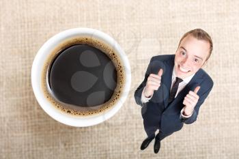 Royalty Free Photo of a Man With a Cup of Coffee