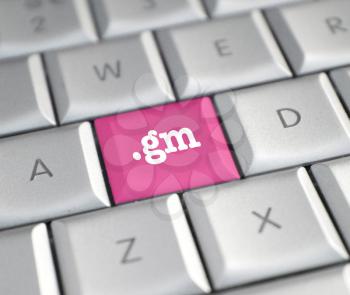 The .gm domain name on a keyboard key