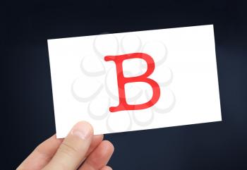 The letter B on a card