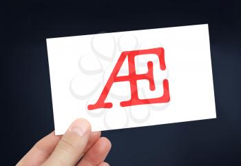 The letter Æ on a card