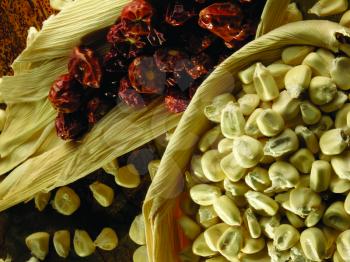 Royalty Free Photo of Dried Chilies and Corn Kernels