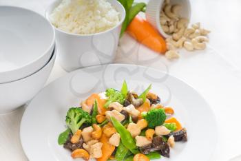 fresh chicken and vegetables stir fried with cashew nuts,typical chinese dish