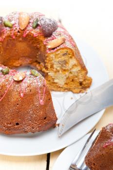 fresh chestnut cake bread dessert with almonds and pistachios on top