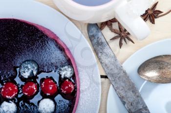 english black tea and berries dessert close up 