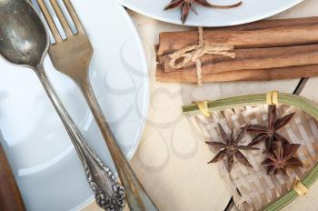 rustic table set  and spices knife spoon fork view from top
