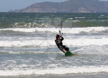 Royalty Free Photo of a Person Kite Surfing 