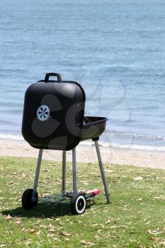 Royalty Free Photo of a Barbecue at the Beach