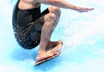 Royalty Free Photo of a Person on a Surfboard