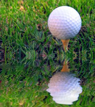 Royalty Free Photo of a Golf Ball on a Tee