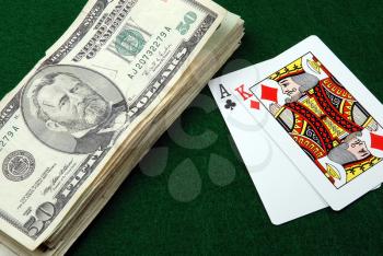 Royalty Free Photo of Playing Cards and Money