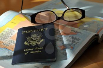 Royalty Free Photo of a Passport and Map
