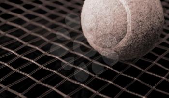 Royalty Free Photo of a Tennis Ball and Racket