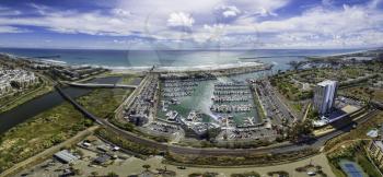 Royalty Free Photo of an Aerial Panoramic of the Oceanside Harbor in Oceanside, California, USA.