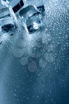 Royalty Free Photo of Ice Cubes and Water Drops