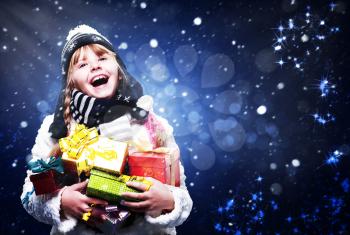 Happy young girl with many Christmas gifts, abstract art backgrounds