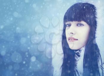 Winter girl. Beauty female portrait with copy space